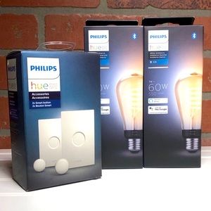2 white ambiance Hue Edison bulbs with 2 pack button box.